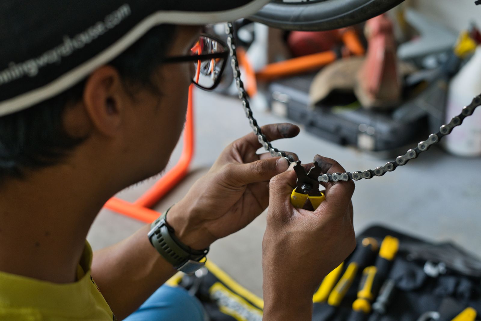 Close-up of bicycle chain maintenance